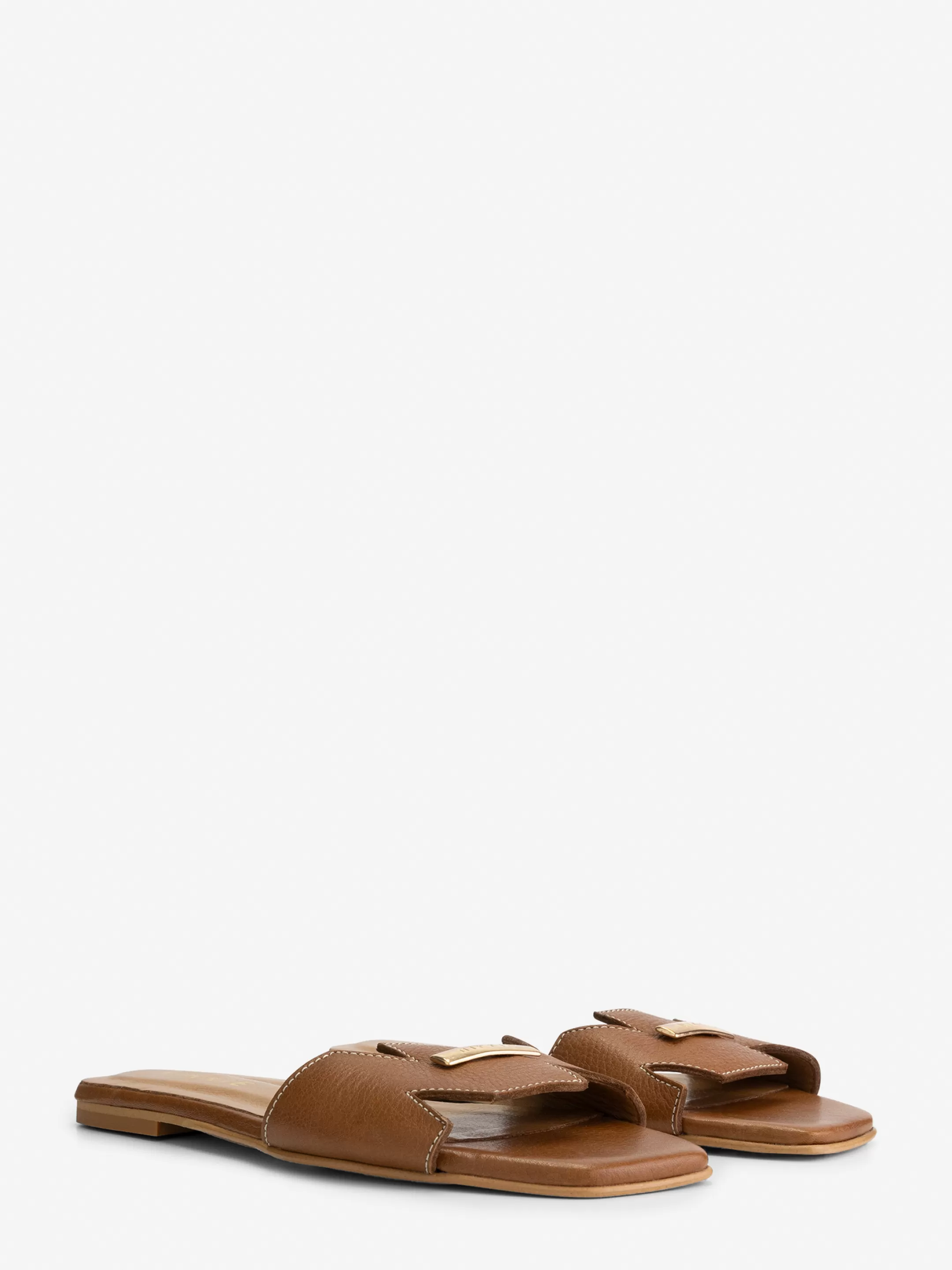 Store NIKKIE Leather slides Cognac