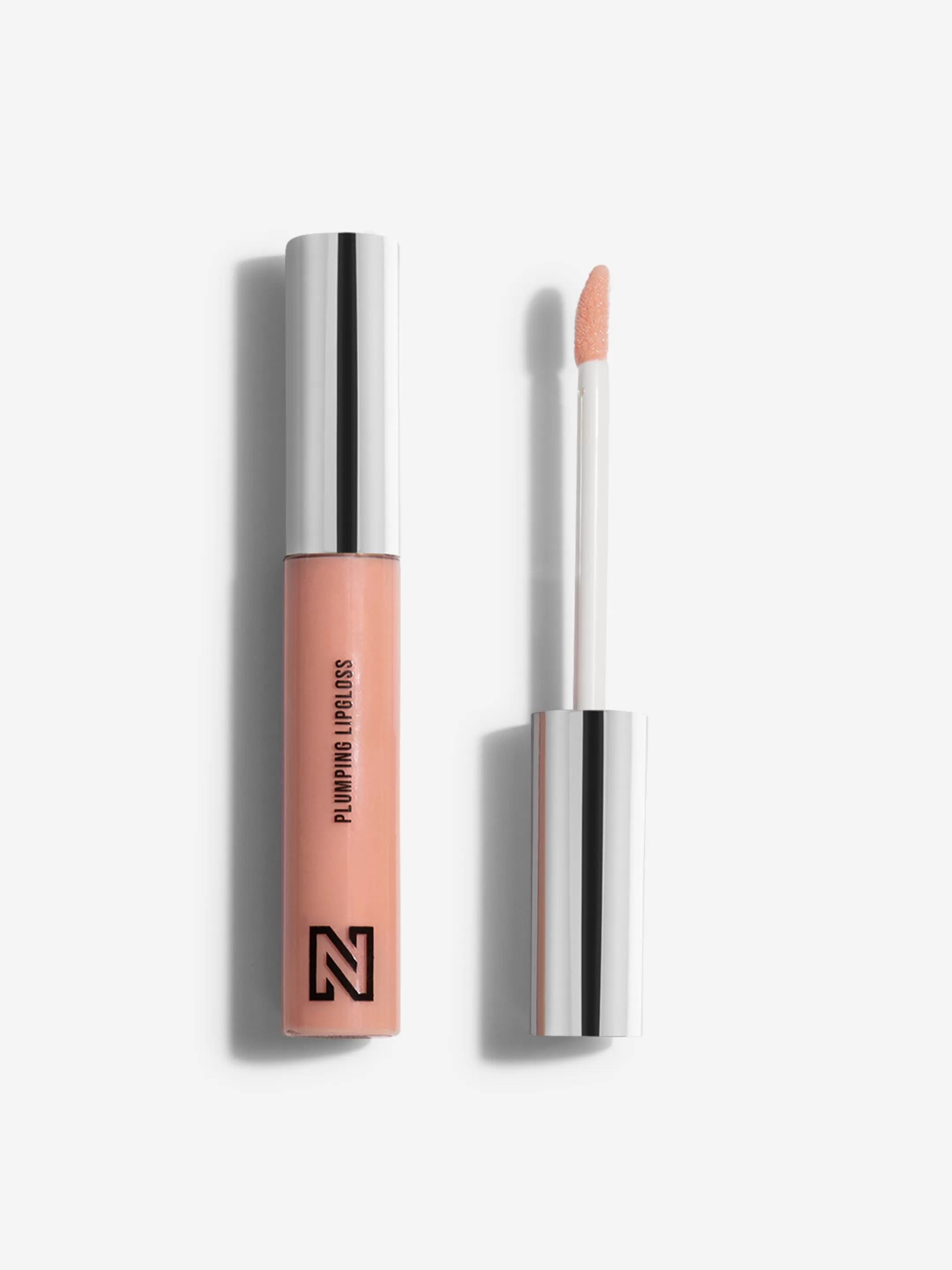 Store NIKKIE PLUMPING GLOSS 004 - Peach